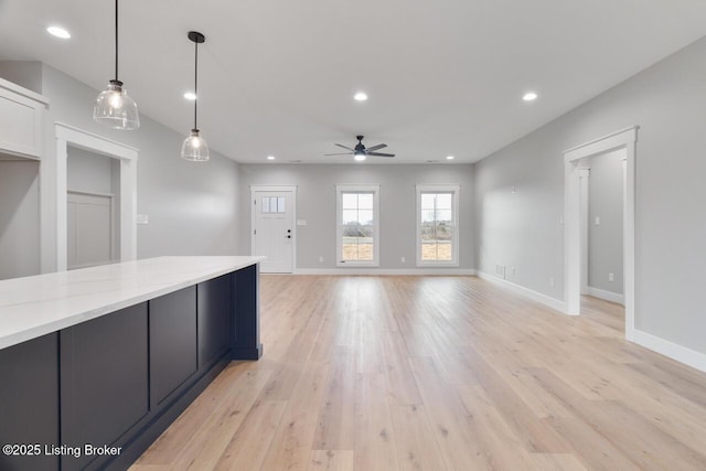 488 Capps Rd, Campbellsville, KY 42718 - unfurnished living room with a ceiling fan, light wood-style flooring, baseboards, and recessed lighting