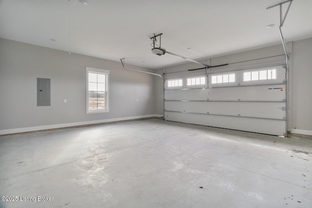 488 Capps Rd, Campbellsville, KY 42718 - garage featuring electric panel, a garage door opener, and baseboards
