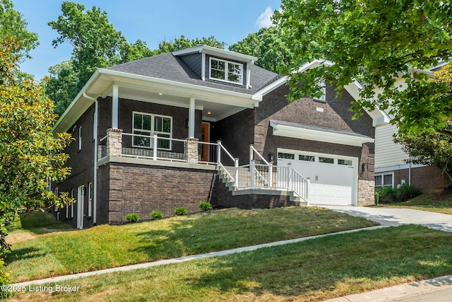 912 Artisan Pkwy, La Grange, KY 40031 - craftsman-style house featuring a porch, an attached garage, driveway, a front lawn, and stone siding