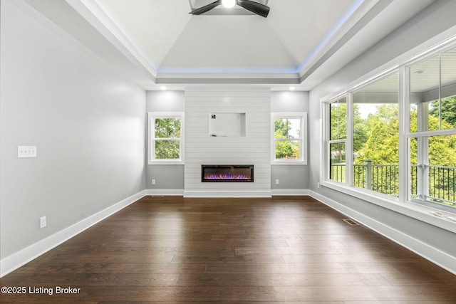 912 Artisan Pkwy, La Grange, KY 40031 - unfurnished living room with a ceiling fan, dark wood-style flooring, lofted ceiling, a fireplace, and baseboards