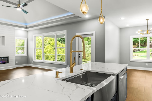912 Artisan Pkwy, La Grange, KY 40031 - kitchen with a sink, baseboards, hanging light fixtures, dark wood-type flooring, and recessed lighting