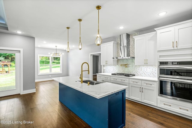 912 Artisan Pkwy, La Grange, KY 40031 - kitchen featuring wall chimney exhaust hood, stainless steel appliances, a sink, backsplash, and white cabinetry