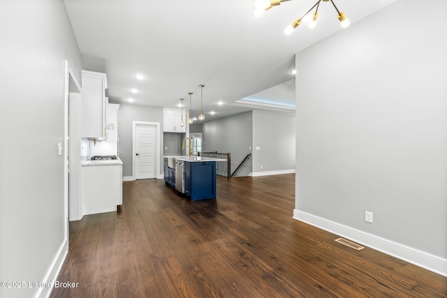 912 Artisan Pkwy, La Grange, KY 40031 - kitchen featuring white cabinetry, light countertops, blue cabinets, baseboards, and recessed lighting