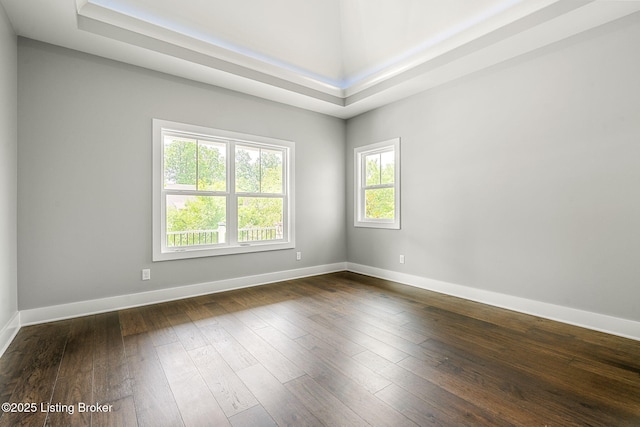 912 Artisan Pkwy, La Grange, KY 40031 - unfurnished room featuring baseboards and dark wood-style floors