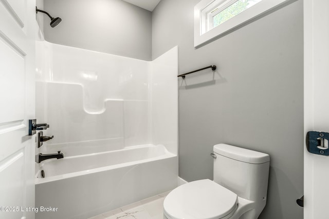 912 Artisan Pkwy, La Grange, KY 40031 - bathroom featuring toilet, shower / bath combination, and marble finish floors