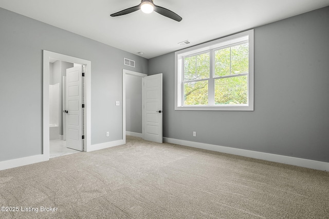 912 Artisan Pkwy, La Grange, KY 40031 - unfurnished bedroom featuring carpet floors, baseboards, ensuite bathroom, and a ceiling fan