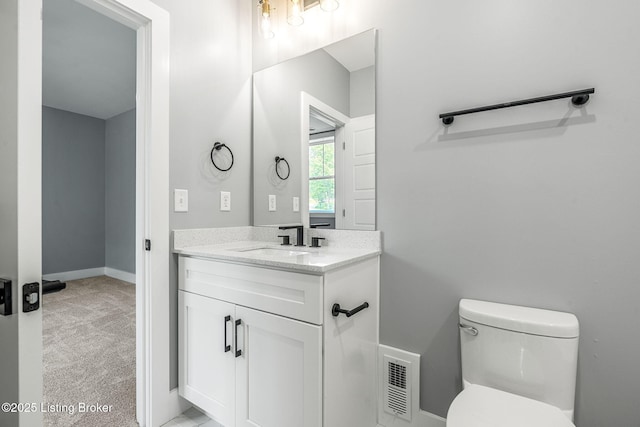 912 Artisan Pkwy, La Grange, KY 40031 - bathroom featuring vanity, toilet, and baseboards