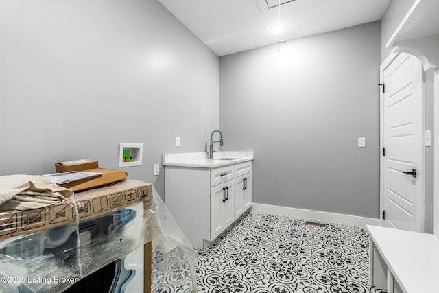 912 Artisan Pkwy, La Grange, KY 40031 - laundry room with hookup for a washing machine, attic access, and baseboards