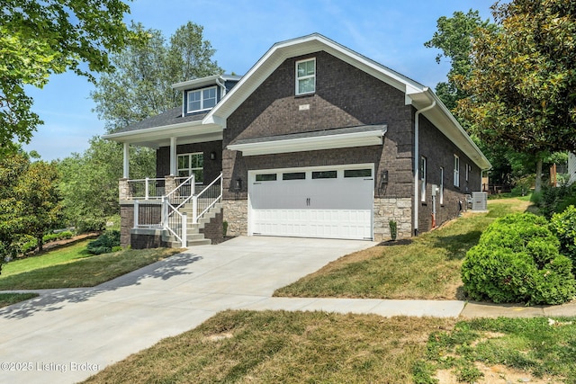 912 Artisan Pkwy, La Grange, KY 40031 - craftsman house with a porch, concrete driveway, a front lawn, cooling unit, and stairs