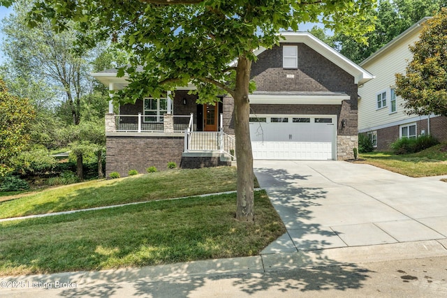 912 Artisan Pkwy, La Grange, KY 40031 - view of front of home with a front yard, concrete driveway, a garage, stone siding, and covered porch