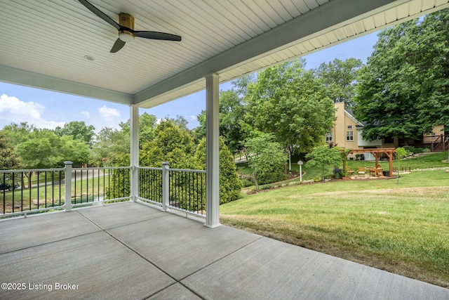 912 Artisan Pkwy, La Grange, KY 40031 - view of patio / terrace with a ceiling fan and view of wooded area