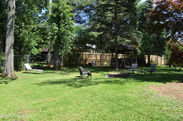 7506 Greenlawn Rd, Louisville, KY 40242 - view of yard featuring an outdoor fire pit