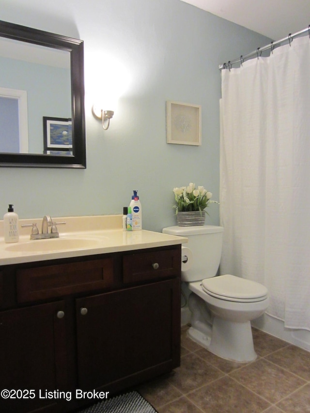 7506 Greenlawn Rd, Louisville, KY 40242 - bathroom featuring vanity, toilet, tile patterned flooring, and a shower with shower curtain