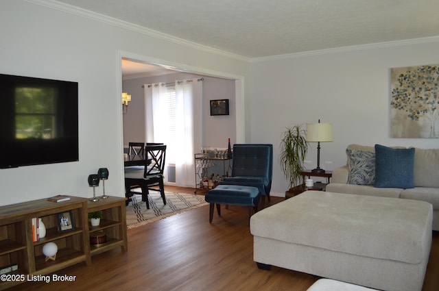 7506 Greenlawn Rd, Louisville, KY 40242 - living area featuring wood finished floors, crown molding, and baseboards