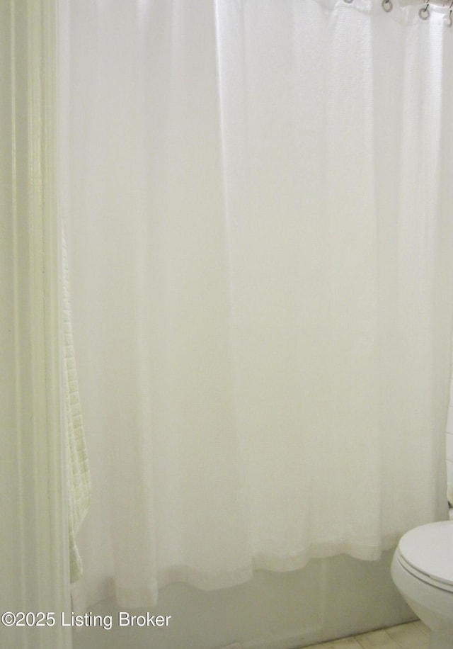 7506 Greenlawn Rd, Louisville, KY 40242 - bathroom with toilet, tile patterned flooring, and a shower with curtain