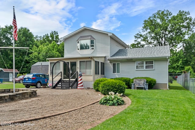 1261 Lipps Ln, Louisville, KY 40219 - view of front of house with a sunroom and roof with shingles