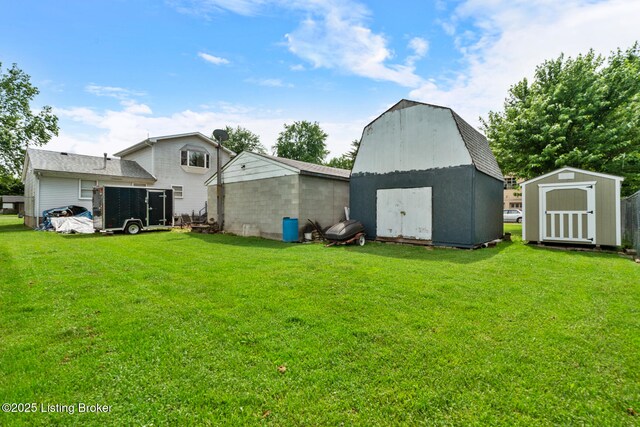 1261 Lipps Ln, Louisville, KY 40219 - rear view of property featuring a yard