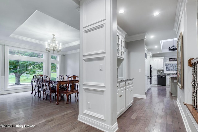 603 Woodlake Dr, Louisville, KY 40245 - kitchen with white cabinetry, a chandelier, ornamental molding, wood-type flooring, and dishwasher