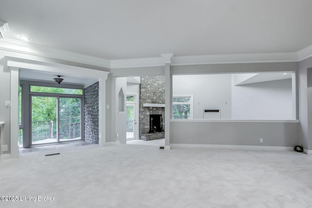 603 Woodlake Dr, Louisville, KY 40245 - unfurnished living room featuring crown molding, carpet, healthy amount of natural light, a fireplace, and baseboards