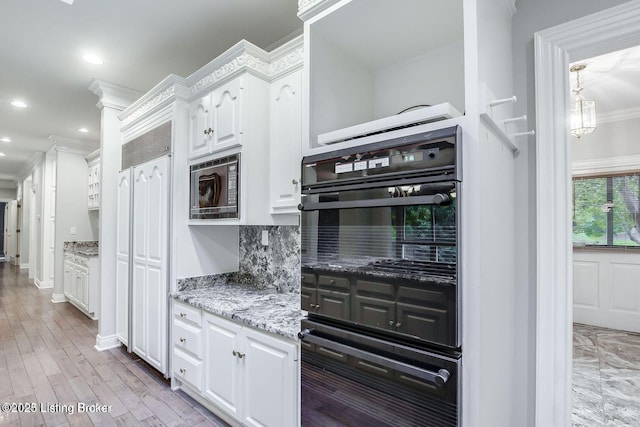 603 Woodlake Dr, Louisville, KY 40245 - kitchen featuring ornamental molding, built in microwave, white cabinets, light stone counters, and recessed lighting