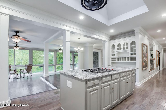 603 Woodlake Dr, Louisville, KY 40245 - kitchen with ceiling fan, stainless steel gas cooktop, healthy amount of natural light, ornamental molding, and a chandelier