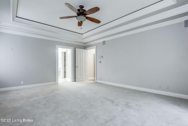 603 Woodlake Dr, Louisville, KY 40245 - empty room with a tray ceiling, ornamental molding, ceiling fan, and baseboards
