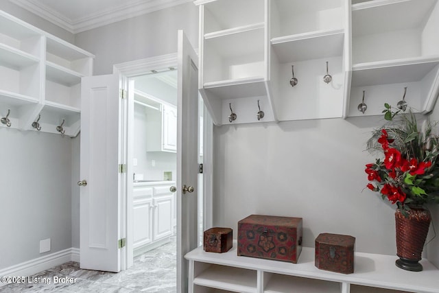 603 Woodlake Dr, Louisville, KY 40245 - mudroom with ornamental molding, light marble finish floors, and baseboards