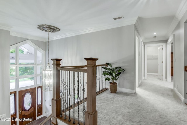 603 Woodlake Dr, Louisville, KY 40245 - hall featuring crown molding, carpet, baseboards, and an upstairs landing