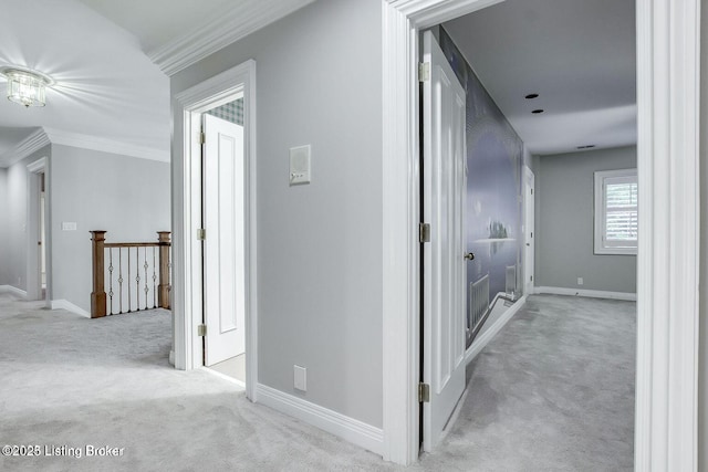 603 Woodlake Dr, Louisville, KY 40245 - hallway with carpet, crown molding, an upstairs landing, and baseboards