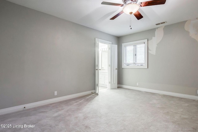 603 Woodlake Dr, Louisville, KY 40245 - unfurnished bedroom with baseboards, light colored carpet, and ceiling fan