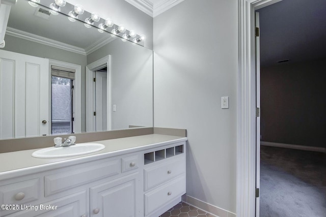 603 Woodlake Dr, Louisville, KY 40245 - bathroom with vanity, ornamental molding, and baseboards