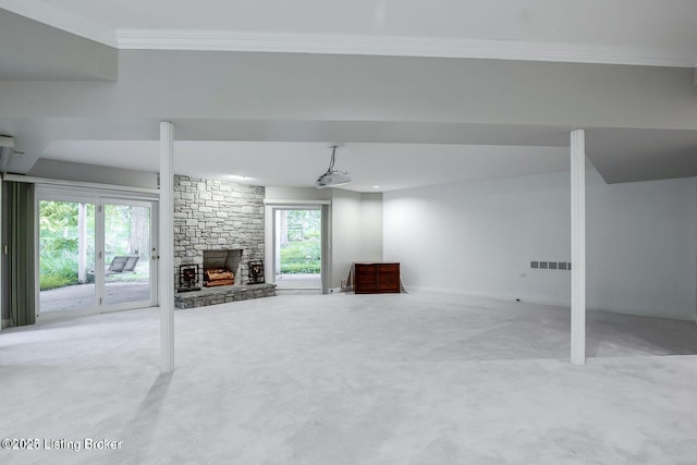 603 Woodlake Dr, Louisville, KY 40245 - unfurnished living room featuring ornamental molding, carpet, a stone fireplace, and baseboards