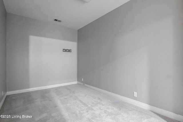 603 Woodlake Dr, Louisville, KY 40245 - spare room featuring carpet floors and baseboards