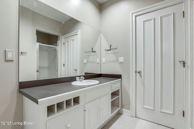 603 Woodlake Dr, Louisville, KY 40245 - full bath featuring vanity, a stall shower, and tile patterned flooring
