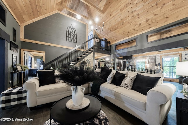 282 Lakeview Ln, Mcdaniels, KY 40152 - living area with high vaulted ceiling, wood ceiling, stairs, wooden walls, and wood finished floors