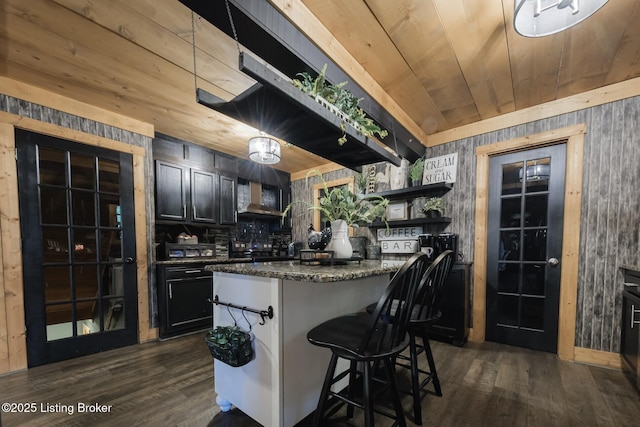 282 Lakeview Ln, Mcdaniels, KY 40152 - kitchen featuring wooden ceiling, dark wood-style flooring, open shelves, a breakfast bar area, and a center island