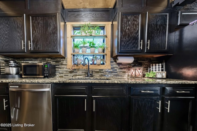 282 Lakeview Ln, Mcdaniels, KY 40152 - bar featuring stainless steel appliances, a sink, and decorative backsplash