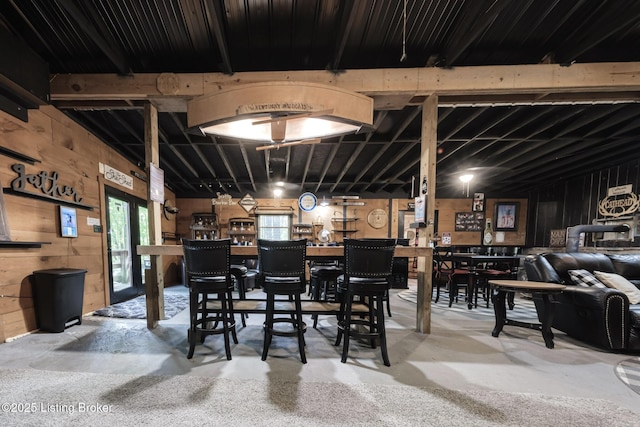 282 Lakeview Ln, Mcdaniels, KY 40152 - dining area with concrete floors and wooden walls