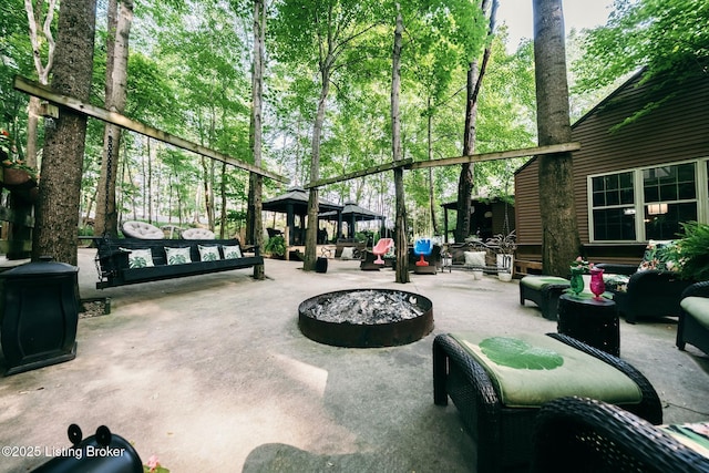 282 Lakeview Ln, Mcdaniels, KY 40152 - view of patio / terrace with a gazebo and an outdoor living space with a fire pit