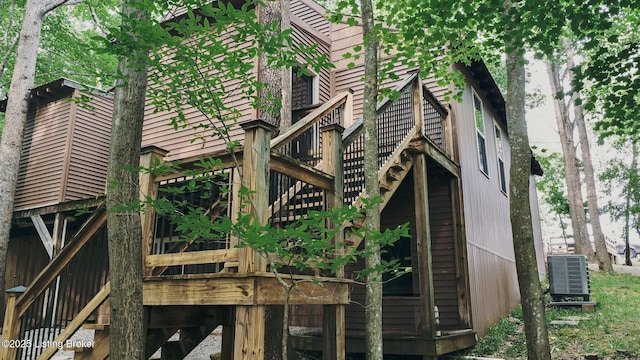 282 Lakeview Ln, Mcdaniels, KY 40152 - back of property with central air condition unit and a deck