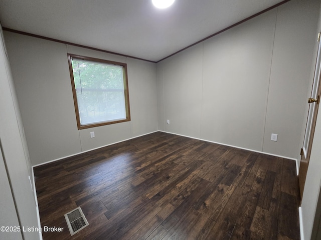 2131 Ridge Rd, Shepherdsville, KY 40165 - empty room featuring dark wood-style floors and ornamental molding