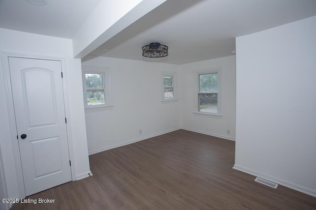1436 Huntoon Ave, Louisville, KY 40215 - unfurnished room with plenty of natural light, dark wood-style floors, and baseboards