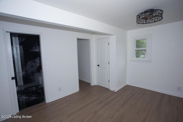 1436 Huntoon Ave, Louisville, KY 40215 - empty room featuring wood finished floors and baseboards