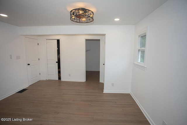 1436 Huntoon Ave, Louisville, KY 40215 - empty room featuring wood finished floors, recessed lighting, and baseboards