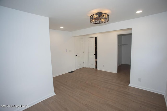 1436 Huntoon Ave, Louisville, KY 40215 - empty room featuring wood finished floors, baseboards, and recessed lighting