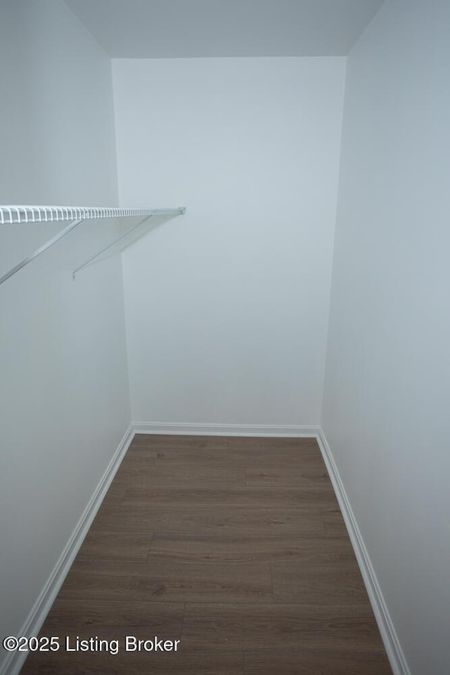 1436 Huntoon Ave, Louisville, KY 40215 - spacious closet featuring dark wood-style flooring