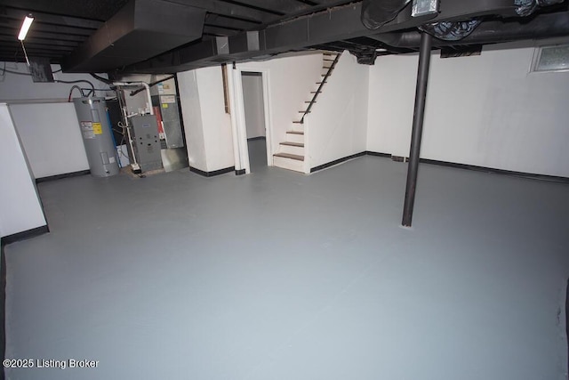 1436 Huntoon Ave, Louisville, KY 40215 - finished below grade area featuring water heater, stairway, heating unit, and baseboards