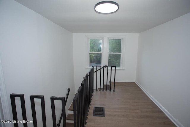 1436 Huntoon Ave, Louisville, KY 40215 - stairway with wood finished floors and baseboards