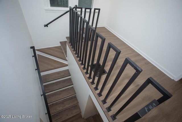 1436 Huntoon Ave, Louisville, KY 40215 - staircase with baseboards and wood finished floors