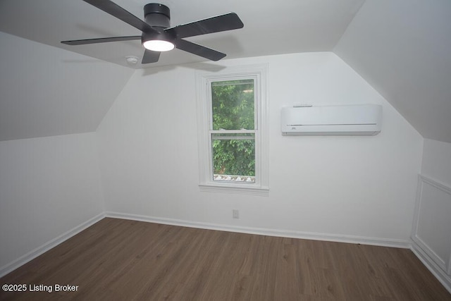 1436 Huntoon Ave, Louisville, KY 40215 - additional living space with a wall mounted air conditioner, wood finished floors, ceiling fan, vaulted ceiling, and baseboards